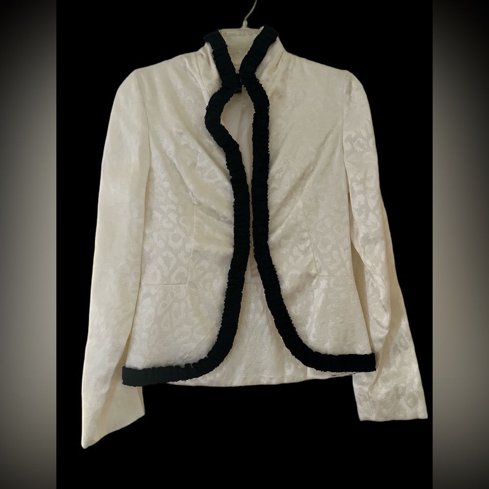 KOEL size small eyelet hook wear as jacket or alone.